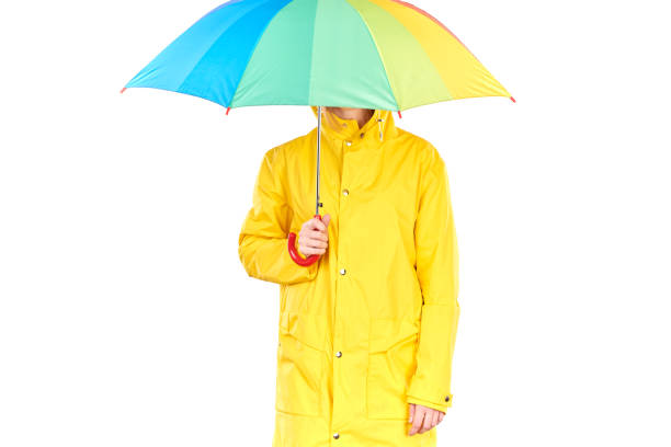 istock Girl in yellow raincoat 832092840