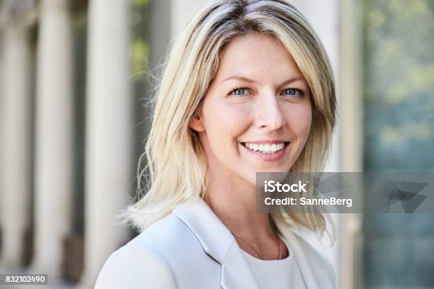 Smiling Blond Businesswoman Stock Photo - Download Image Now - Women, Blond Hair, 35-39 Years