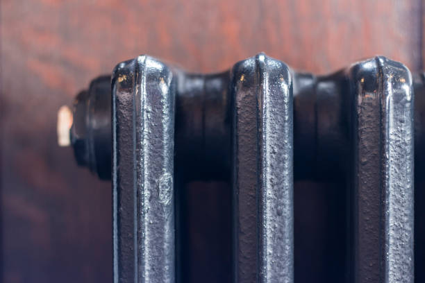 Close up of vintage cast iron radiator stock photo