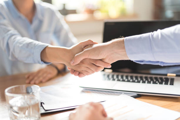 istock Business people shaking hands. Finishing up meeting. 832105502