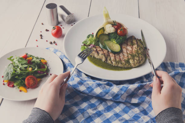 istock Grilled beefsteak with vegetables and green bell pepper sauce 832105546