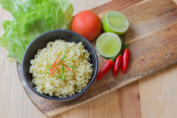 istock Instant noodles in black bowl 832108904