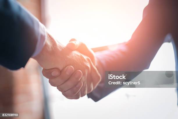 Business People Shaking Hands Finishing Up Meeting Stock Photo - Download Image Now