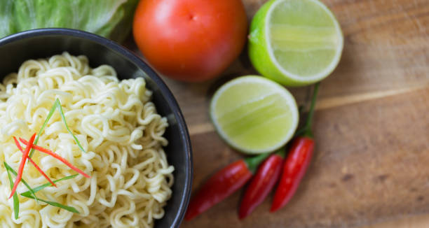 istock Instant noodles in black bowl 832109630
