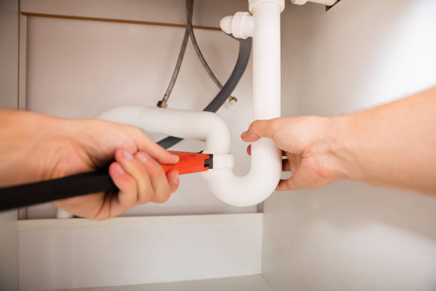 istock Close-up Of Plumber Fixing Sink Pipe 832115514