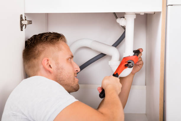 istock Male Plumber Repairing Sink Pipe 832115546