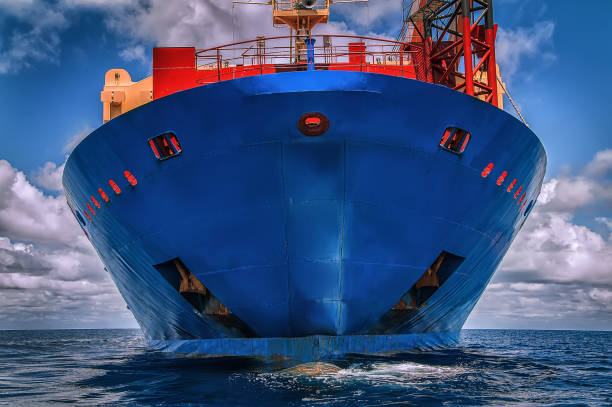 Blue vessel in the ocean Close up of vessel's view in the middle of the ocean ships bow photos stock pictures, royalty-free photos & images