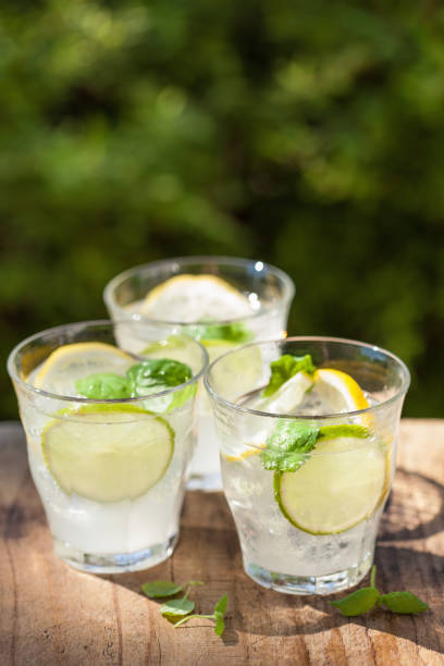 istock refreshing lemonade drink with mint lime lemon in garden 832116490