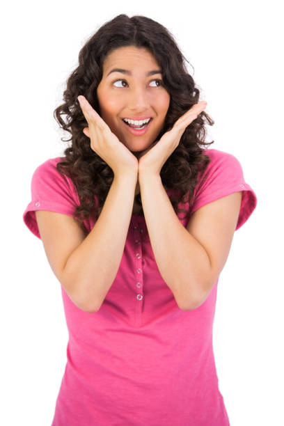 istock Astonished brown haired woman posing 832120260