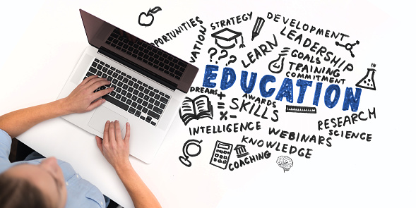 Online education.  Young woman studying on laptop