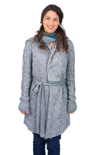 istock Cheerful brunette wearing winter clothes posing 832120838