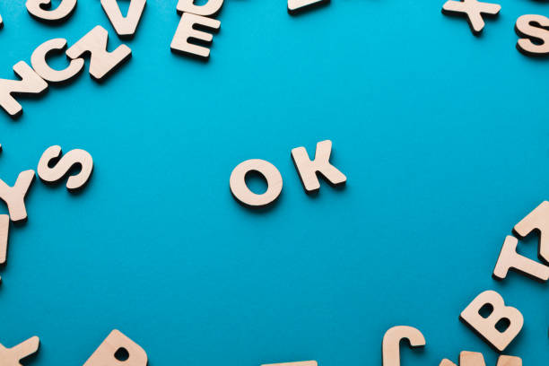 istock Word OK on blue background 832123432