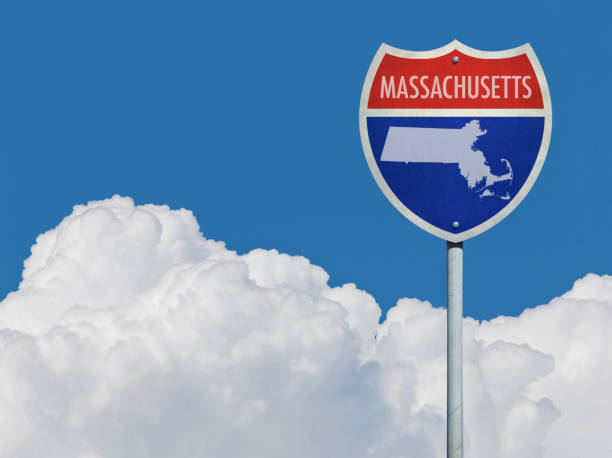 istock Highway sign for Interstate road in Massachusetts with map in front of clouds 832124920