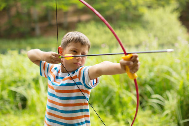 istock Archer boy in nature 832129600