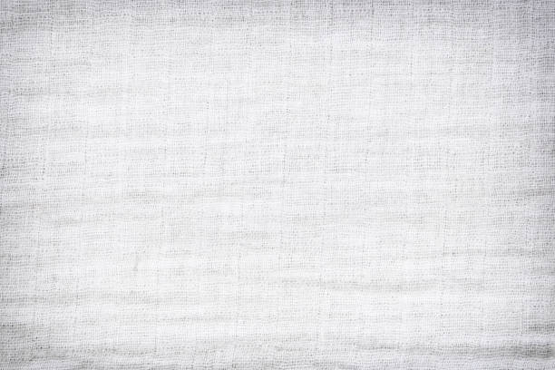 Texture of white raw fabric for the background design,gray fabric texture for backdrop. Texture of white raw fabric for the background design,gray fabric texture for backdrop. gauze stock pictures, royalty-free photos & images