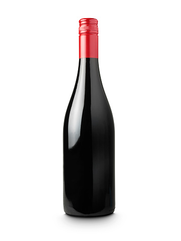 Shot of a red wine bottle with a blank space and clipping path with a white background and copy space