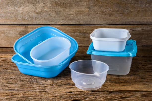 istock Empty containers for food on wooden background 832133930