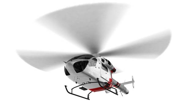 White civilian helicopter in flight isolated on white background stock photo