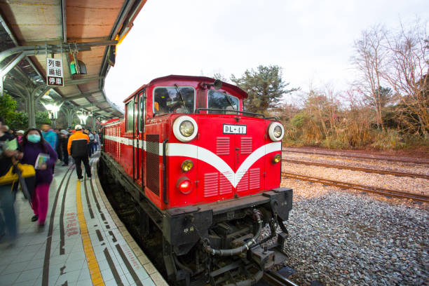 ALISHAN JIA YI TAIWAN-MARCH 5 ,2015: Traditional Train stop in Alishan Train Station for trasport passager to see sun rise in early morning , JIA YI Province, TAIWAN