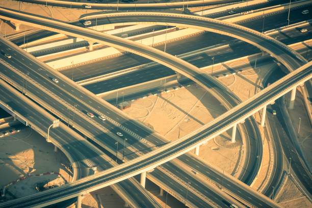 Top view of highway interchange in Dubai, UAE. Toned shot