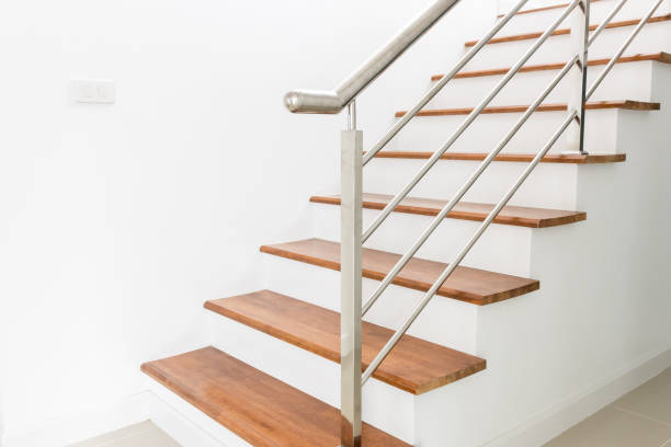 staircase interior design staircase concrete top  wooden stainless steel railing in the home balustrade stock pictures, royalty-free photos & images