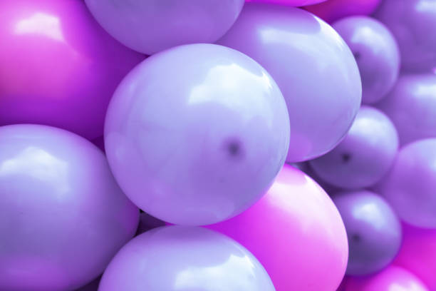 balloons against sky with clouds