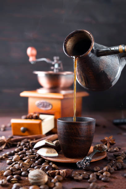 istock Coffee is pouring to the cup. 832153622