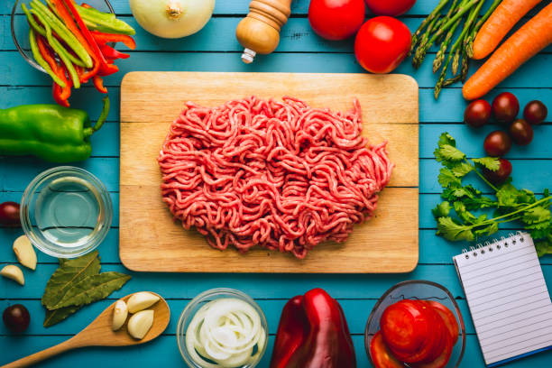 istock Frame of various vegetables and ingredients to cook ground beef 832159416