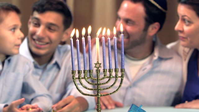 Family celebrating Hanukkah