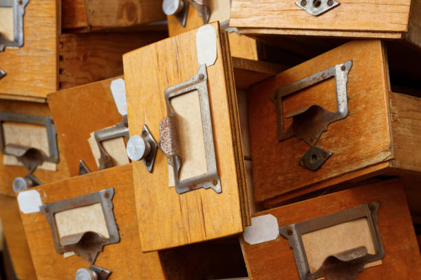 istock Disorderly group of old wooden drawers 832162936