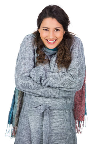 istock Smiling gorgeous model with winter clothes being cold 832166200