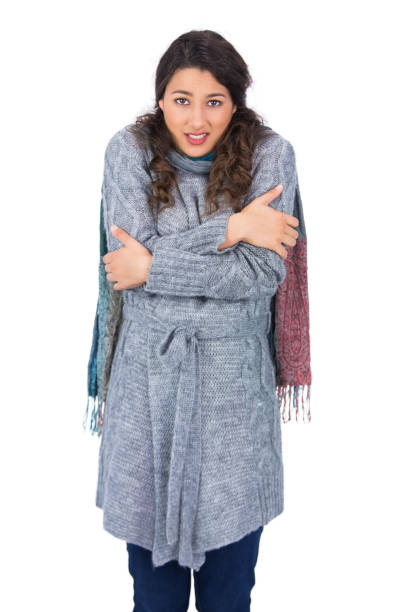 istock Uneasy pretty model with winter clothes being cold 832166534