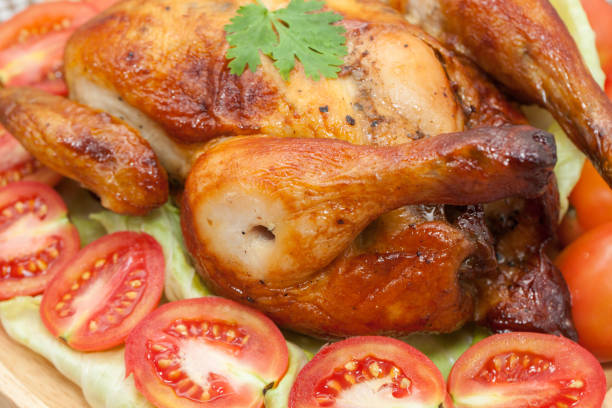 istock roast chicken on wooden plate 832185490
