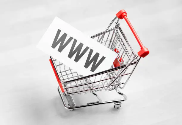 Buying domain name for company website. Online shopping, e commerce and internet store concept. Newsletter and email marketing.