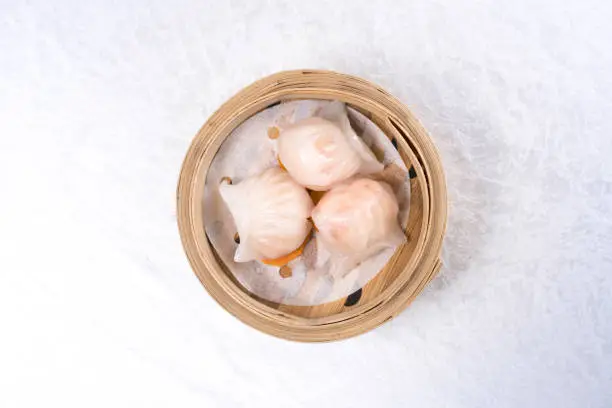 Baozi chinese dumplings on bamboo steamer