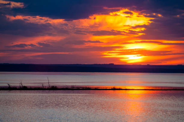 istock sunset dawn on the river. beautiful clouds in the sky 832209216