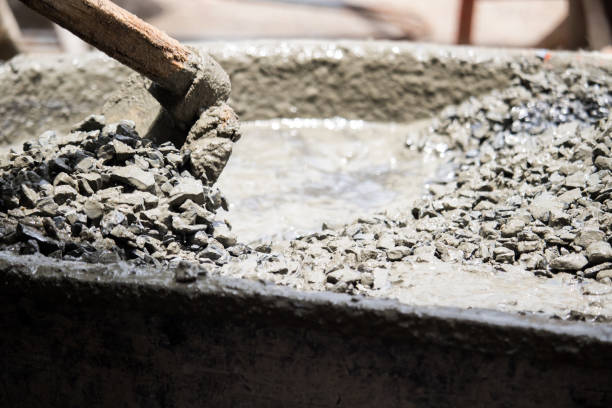 istock Labor is mixing cemen, water, sand together for construction site 832221748