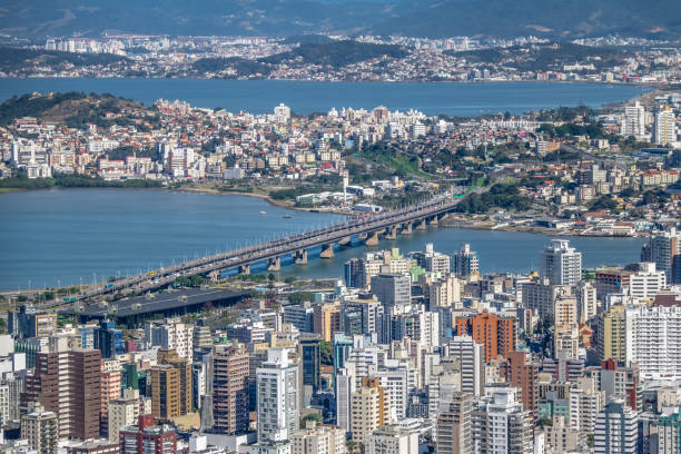 Aerial view of Dowtown Florianopolis City and Pedro Ivo Campos Bridge - Florianopolis, Santa Catarina, Brazia Florianopolis, Brazil - May, 2017: Aerial view of Dowtown Florianopolis City and Pedro Ivo Campos Bridge - Florianopolis, Santa Catarina, Brazia florianópolis stock pictures, royalty-free photos & images