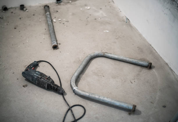 istock Plunbing pipe and the drill on the floor 832249358