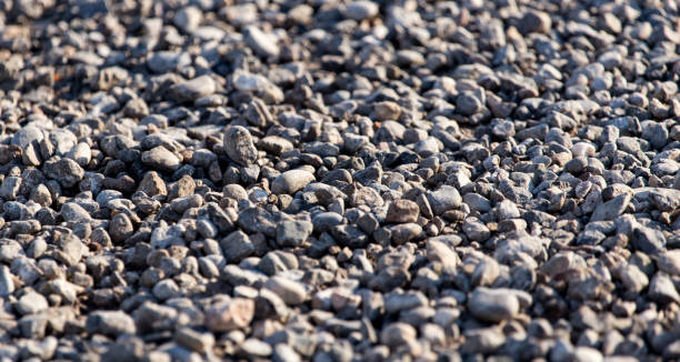 istock Crushed stone on the road as a background 832249978