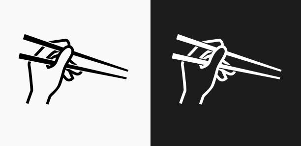 ilustrações de stock, clip art, desenhos animados e ícones de hand holding chopsticks icon on black and white vector backgrounds - human hand on black