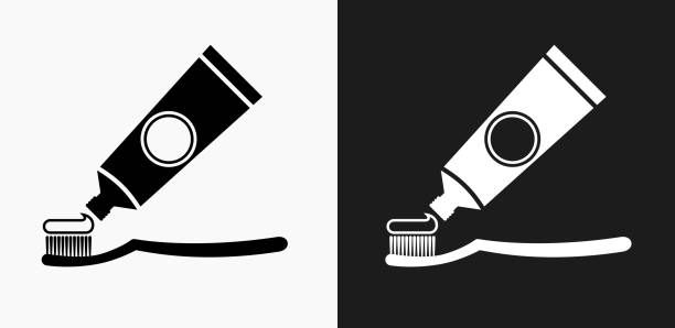 歯ブラシとペーストのアイコンが黒と白のベクトルの背景 - toothpaste点のイラスト素材／クリップアート素材／マンガ素材／アイコン素材