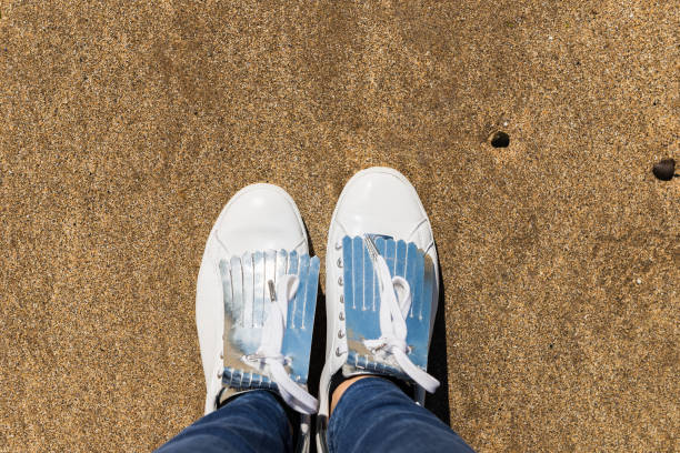 istock Young Woman in White Sneakers, Top View 832256544