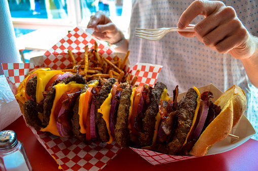 Burger and fries about to get eaten