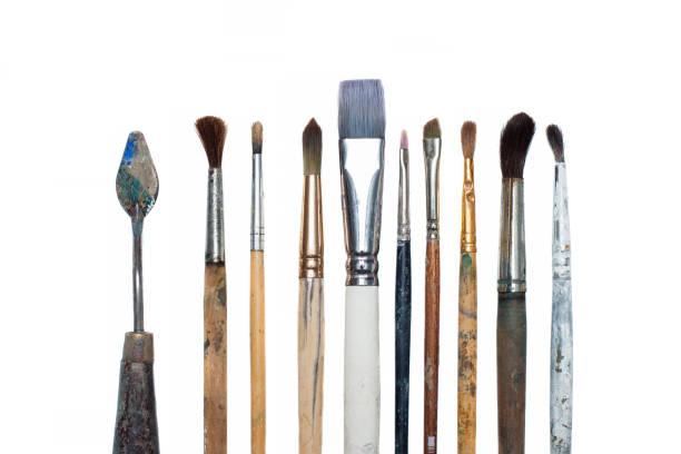 istock Old oil paint brushes isolated 832281072