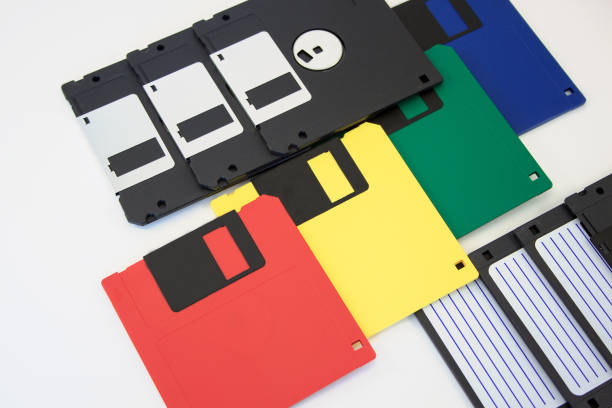 istock Group of multicolored floppy disks on a white background. 832354482