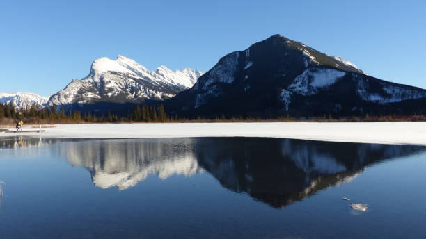 istock Mountains reflection in the lake 832439022