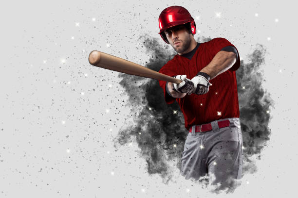 Baseball Player Baseball Player with a red uniform coming out of a blast of smoke . home run photos stock pictures, royalty-free photos & images