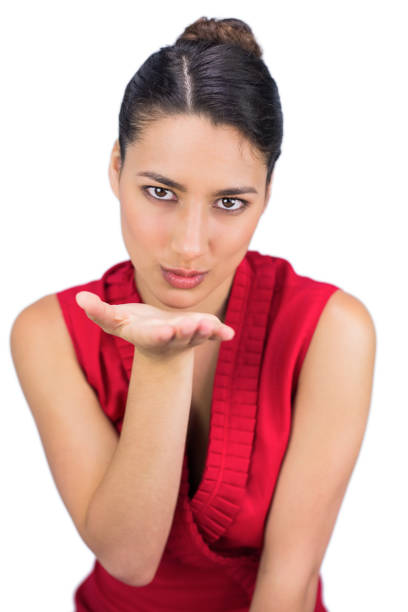 istock Tied haired brunette sending kissing to camera 832461546
