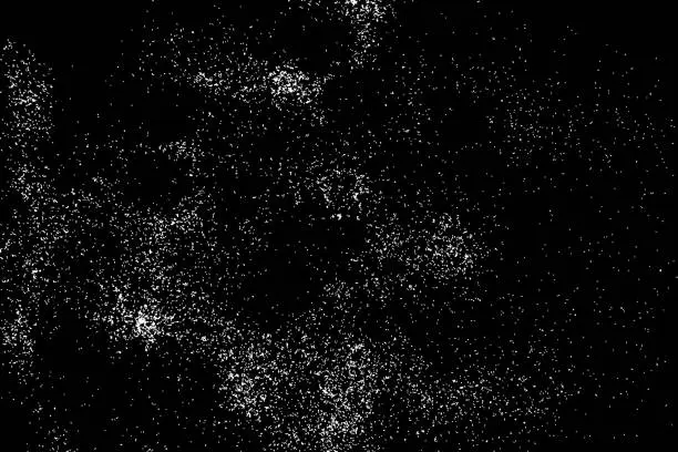 Vector illustration of Abstract grainy texture isolated on black background. Silhouette of food flakes such as salt or almond or wheat flour spread on the flat surface or table. Top view. Dust, sand blow or bread crumbs.